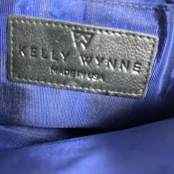 Kelly Wynne metallic gold and black wristlet with a gold tone logo accent - Picture 7 of 8